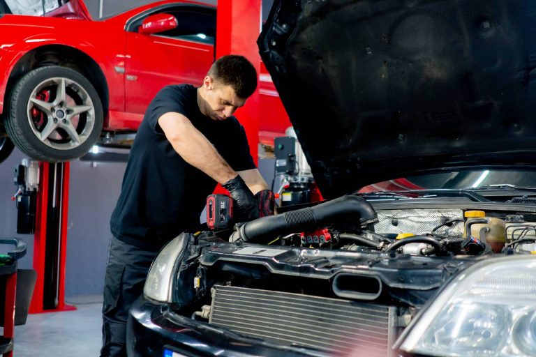 in-a-car-service-center-master-in-a-black-t-shirt-2026-03-16-01-24-56-utc-1