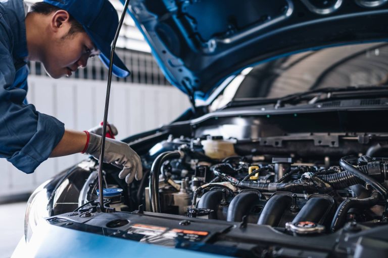maintenance-worker-checking-tire-service-via-insur-2026-01-07-23-22-13-utc-2
